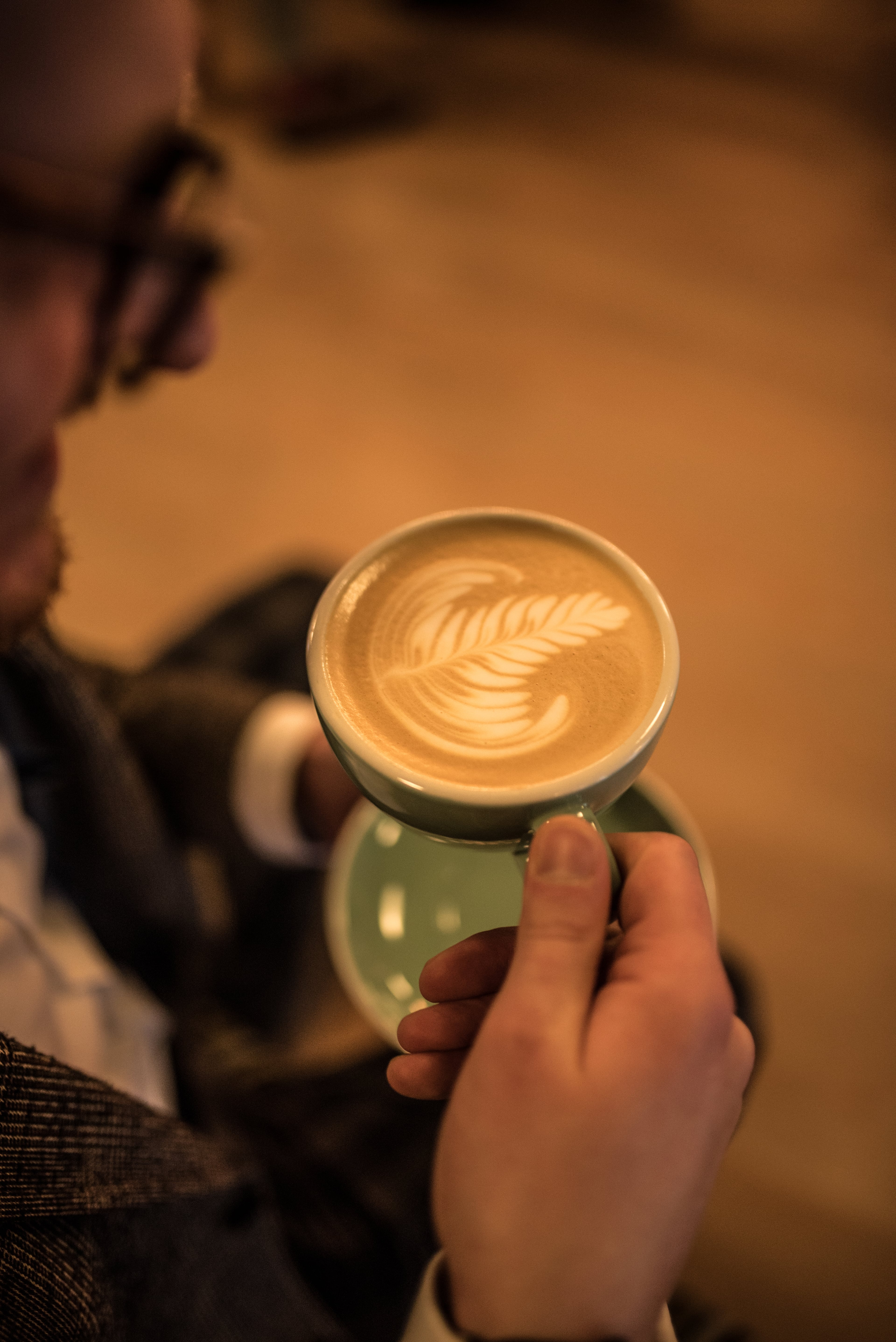 Branded coffee cup at a corporate event